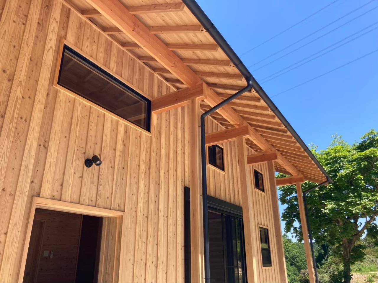 「木」と「ガルバリウム」<br />ナチュラルモダンな木の家